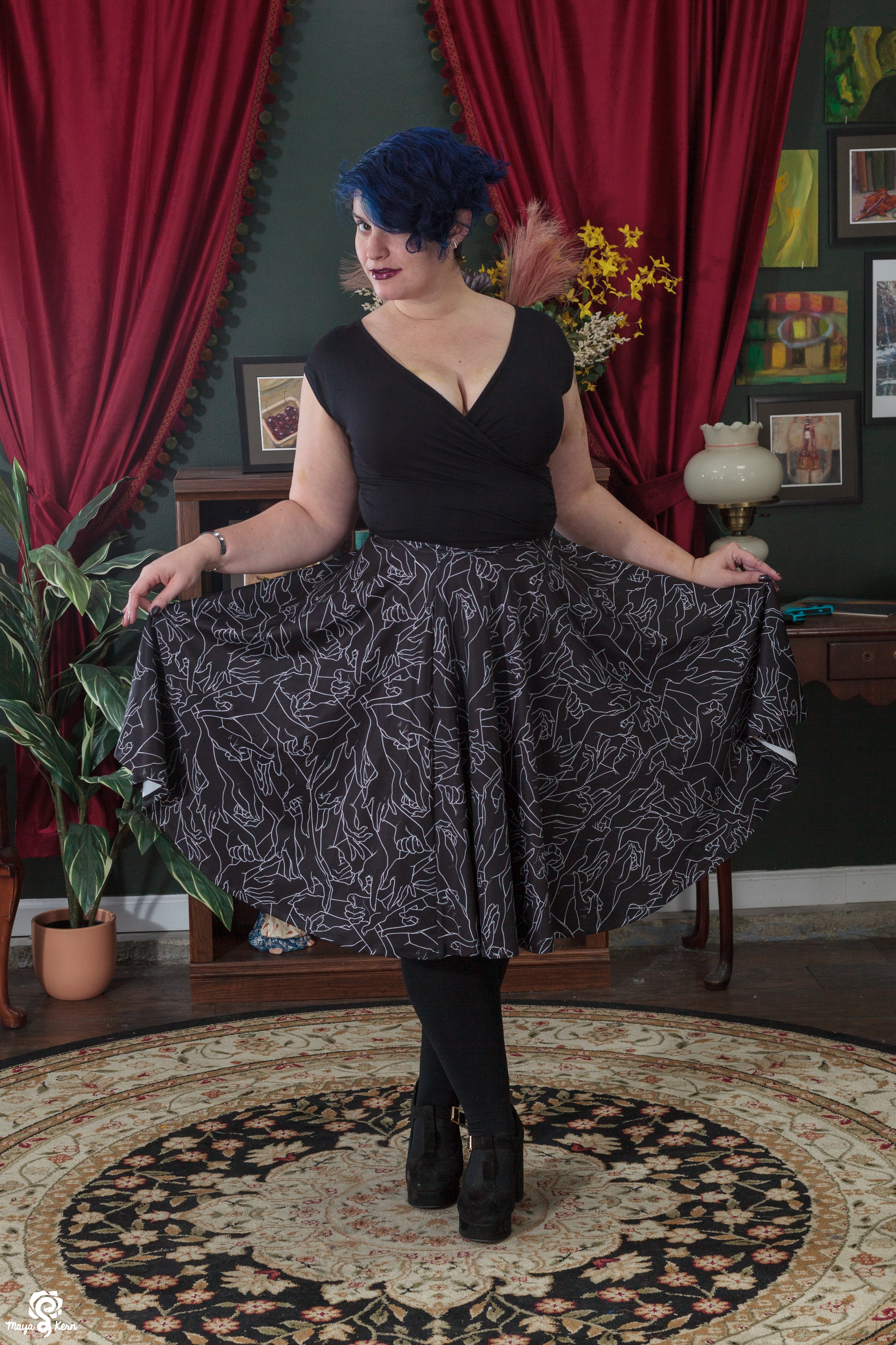 Midi black skirt with clearance pockets